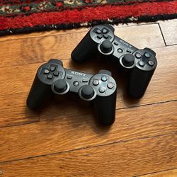 Two Wireless PlayStation Controllers 