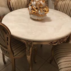 A Marble Top Antique Leaf 4Seater Dinning Table