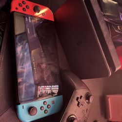 Nintendo Switch OLED – Excellent Condition (Dock + Joy-Con Grip Included)