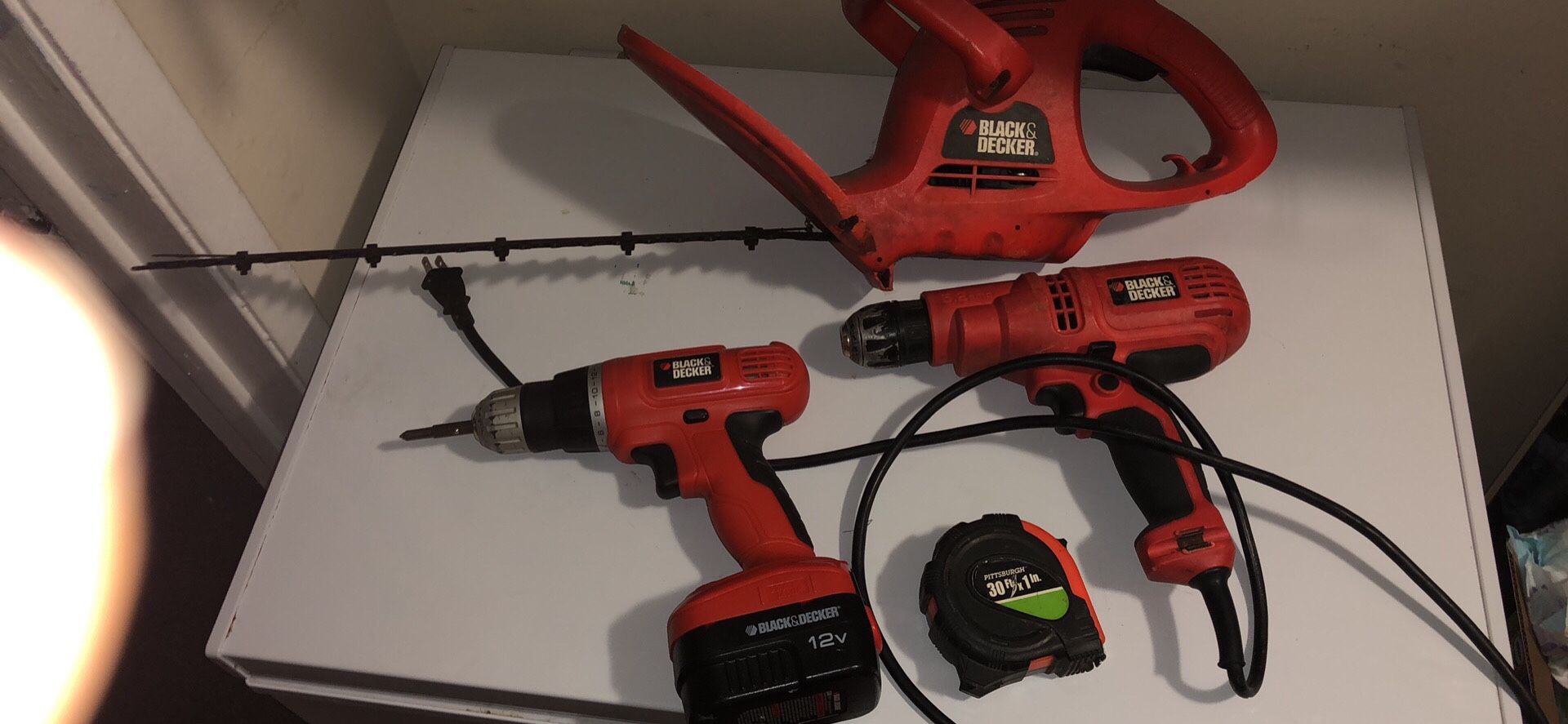 Black and Decker 4 items ( battery operated drill , cord drill , measuring tape and Hedge Trimmers 175$ obo