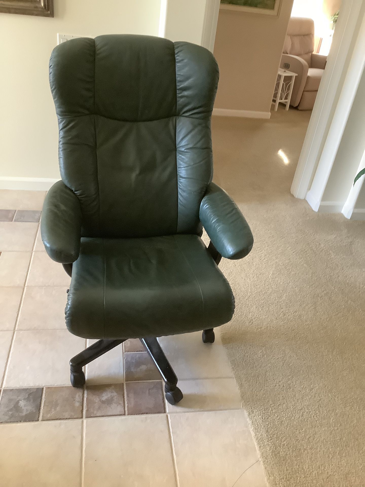 Office Chair , Swivels And Adjustable. 46” High By 29” Wide