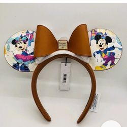 Mickey Mouse & Friends Dooney & Bourke Ear Headband-Disneyland 70th Anniversary

Features Mickey and Minnie In celebration of Disney Parks 70th annive