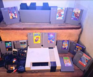 Nintendo NES Console w/ 11 games, all wires, controller, adapter ,storage