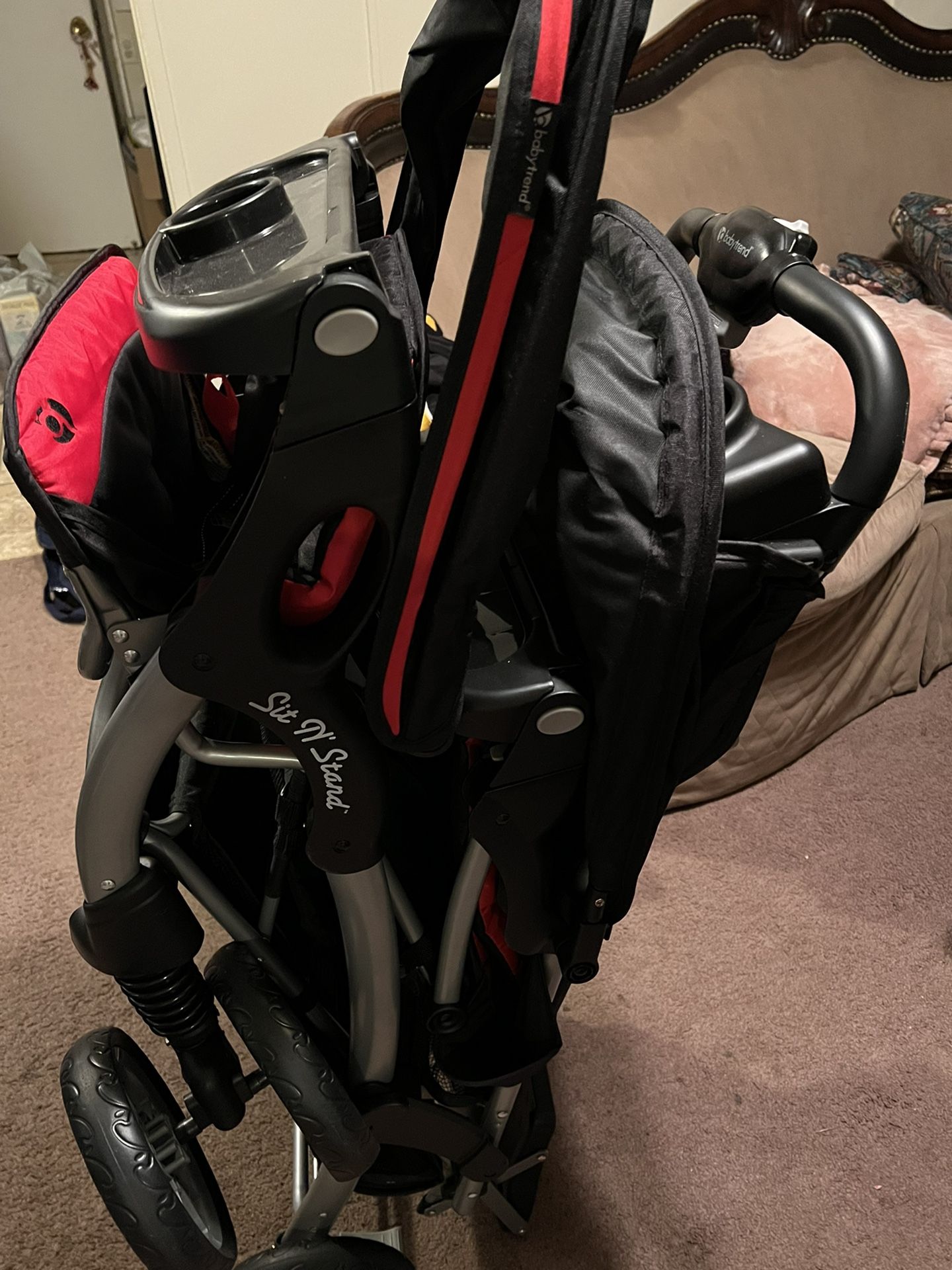 Red Baby Trend Two Seat Stroller