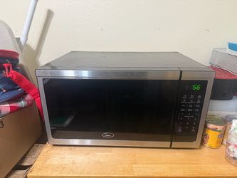 Garage Sale Tv 55 microwave and woman clothes and Luxury accessories