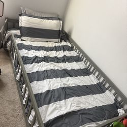 Floor level twin bed with mattress