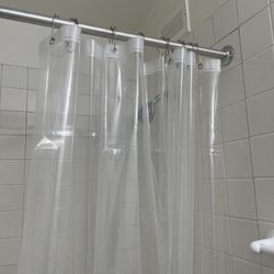 Curtain And Hooks In Bathroom