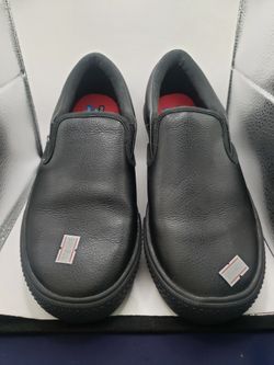 Size 7.5 pair of black leather Skechers Women's Work Gibson-Brogna slip-resistant work shoes