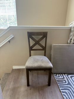 3 brown chairs