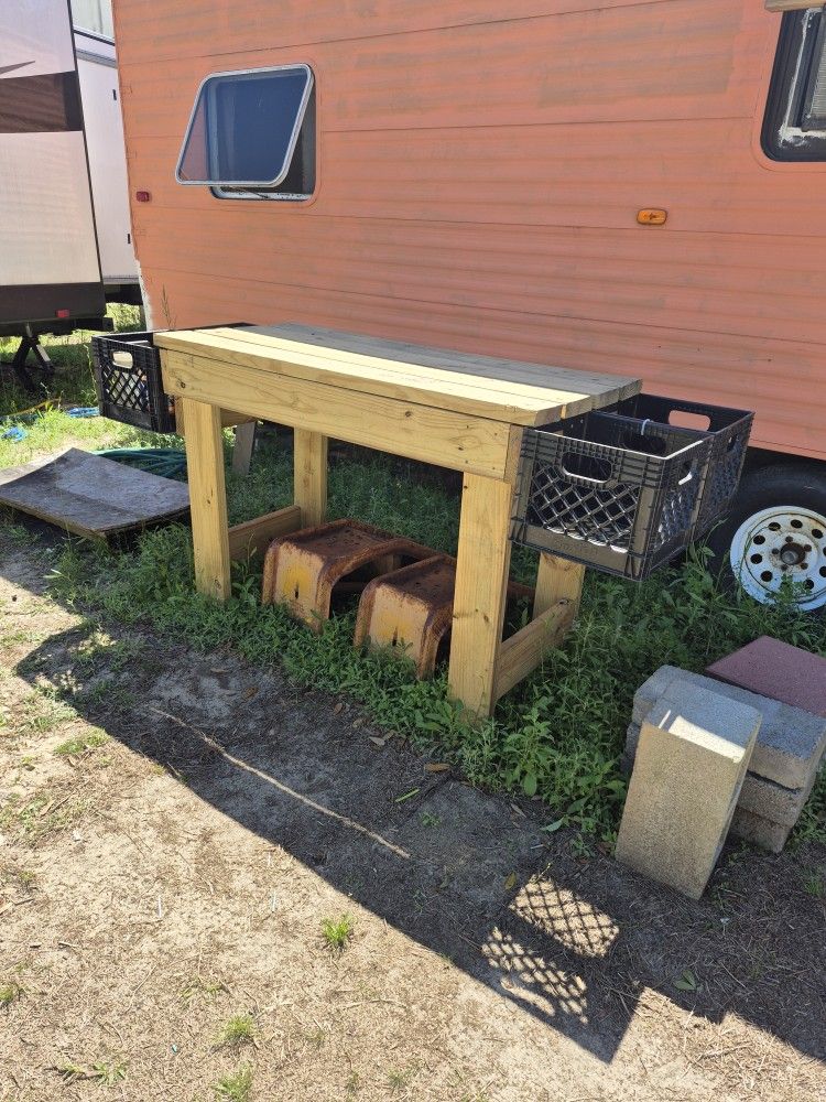 New Handmade Treated Wooden Workbench With Storage Crates On Both Sides