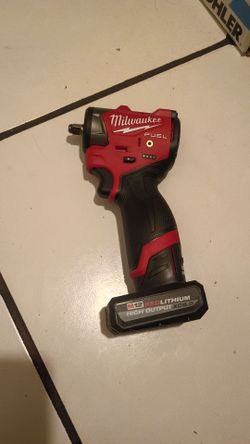 Milwaukee M12 subcompact 3/8 with battery 5ah .
