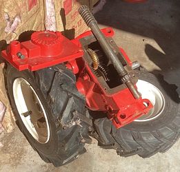 Troy Bilt Horse 4 speed transmission and new tires and wheels.