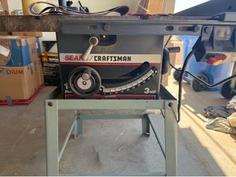Sears Craftsman 10" belt-drive table saw in good working condition.