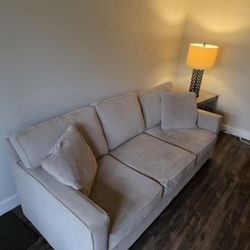 Beige Hide-a-bed couch