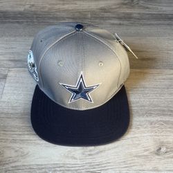 Cowboys Snapback Hat$35