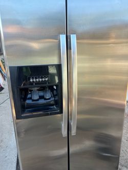 Whirlpool Stainless Steel Side-by-Side Refrigerator with Ice Dispenser