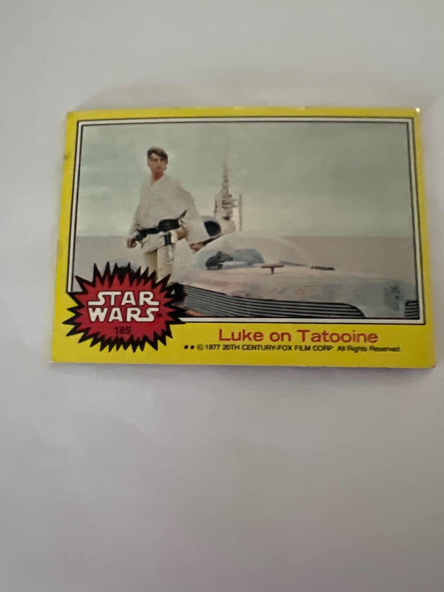 1977 Topps Star Wars Card #185 – Luke on Tatooine (Yellow Series) Vintage