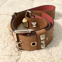PRADA - Studded brown leather belt by the luxury brand Prada.