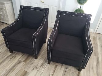 Two black accent chairs