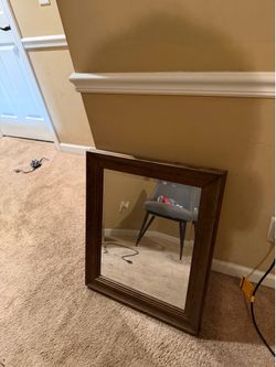 Wooden framed wall mirror