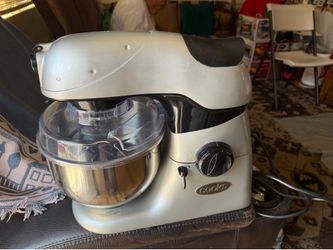 Stand mixer in excellent condition  works great with attachments stainless bowl  by cooks