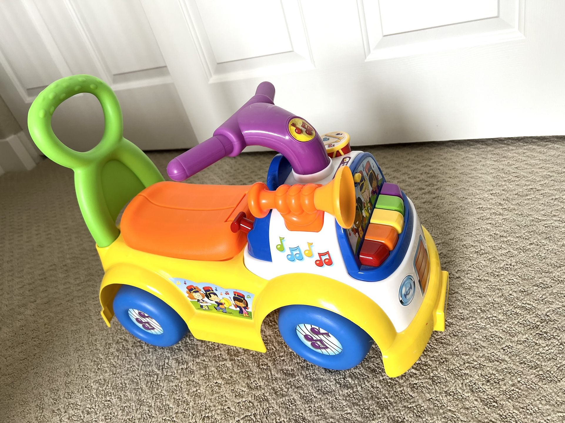 Fisher-Price Little People Music Parade Ride-On Car