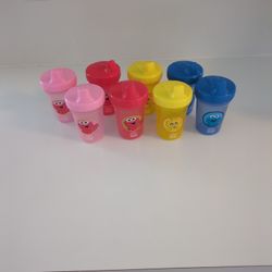 Eight Plastic Sesame Street Sippy Cups