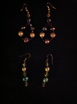 Earrings, pearls and Swarovski.