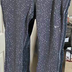 Nike Women's Dri-FIT geometric print capri running leggings. 