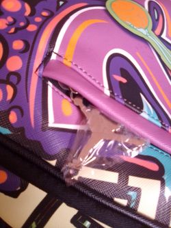 Jordan stepping thru backpack