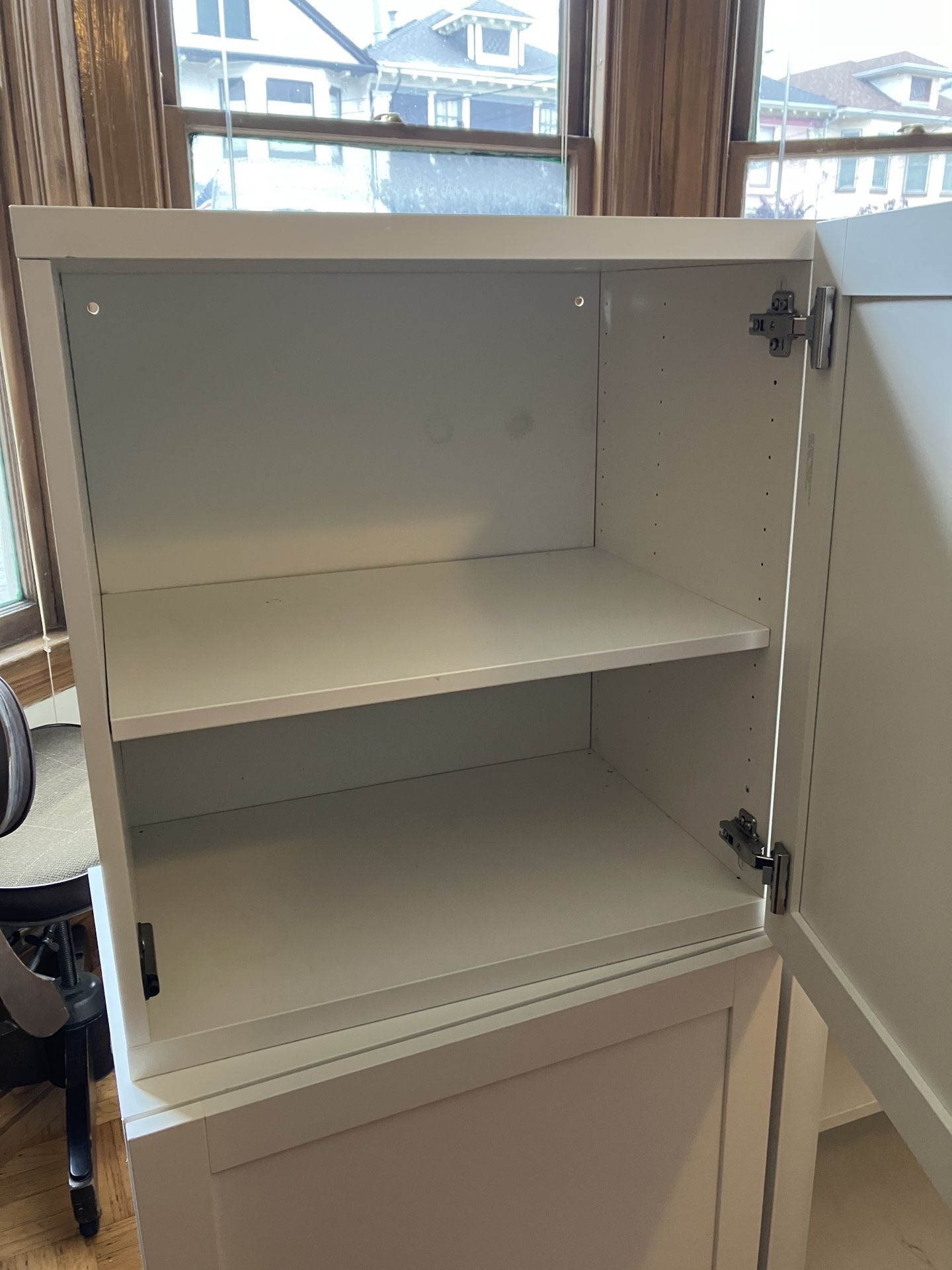 Two IKEA BESTA shelves