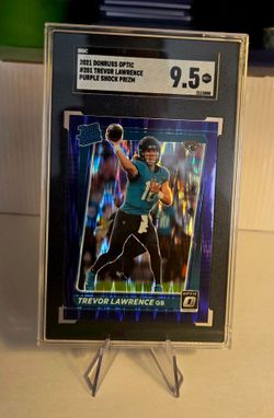 2021 Donruss Optic TREVOR LAWRENCE Rated Rookie Purple Shock SGC 9.5