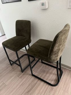 2 Olive green Bar stools.