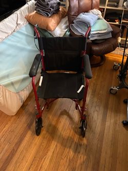 Transport wheelchair