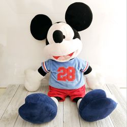 20" Mickey Mouse Disney Jumping Beans Stuffed Animal Plushie with #28 on his T Shirt. 100% Polyester. Pre-owned in excellent condition. No rips, stain