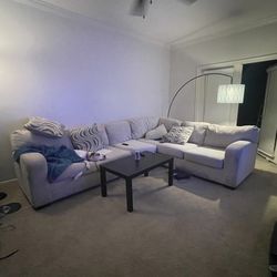 L shaped sectional, lamp and table