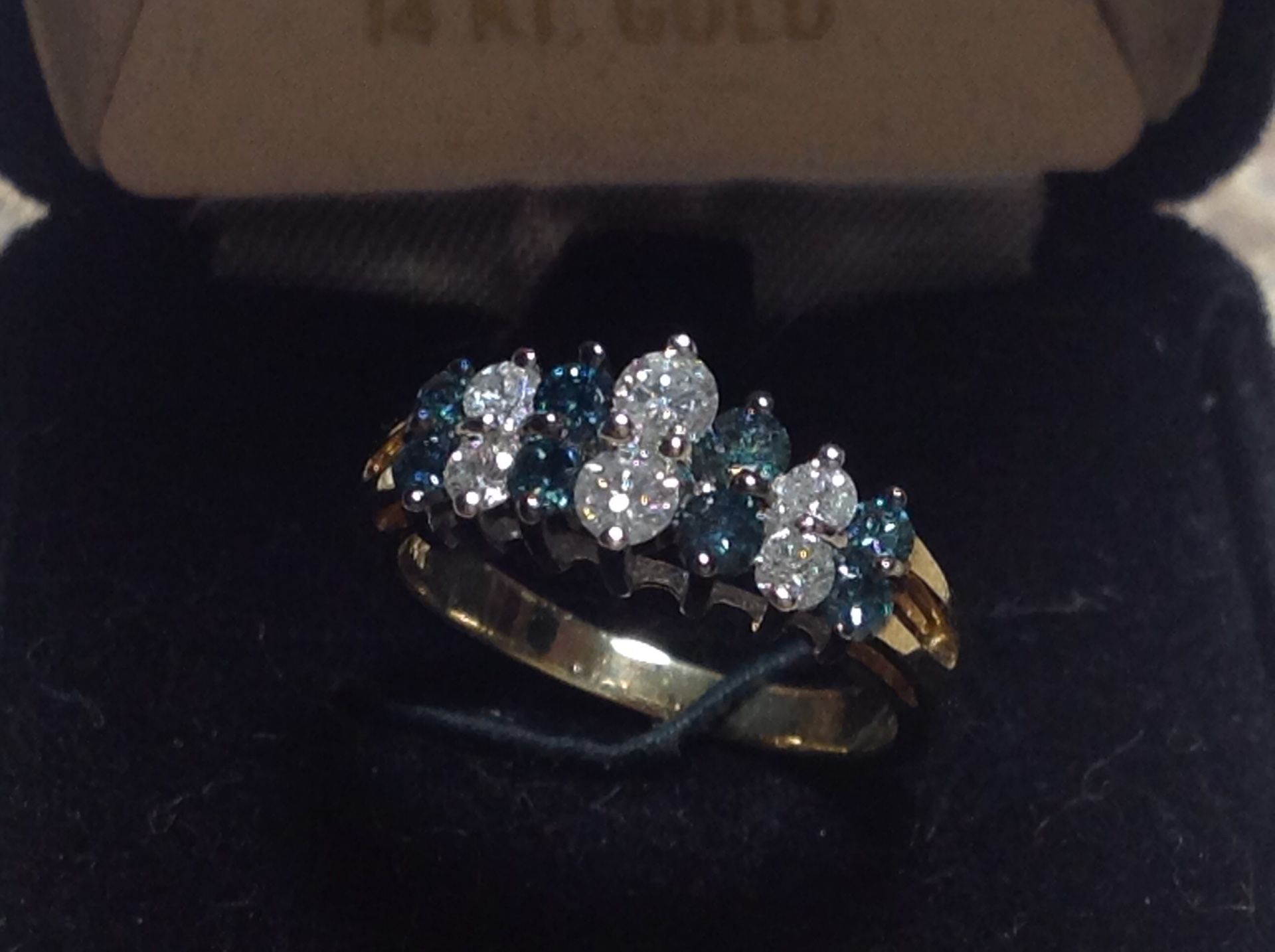 $275. 14K Yellow Gold Ring with 1.00ct White and Blue Diamonds