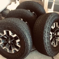 265 70 R 16” Tacoma TRD Off Road  Wheels Like New Tires @ 40%. $450