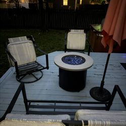 Outdoor Couch, Chairs, And Gas Firpit