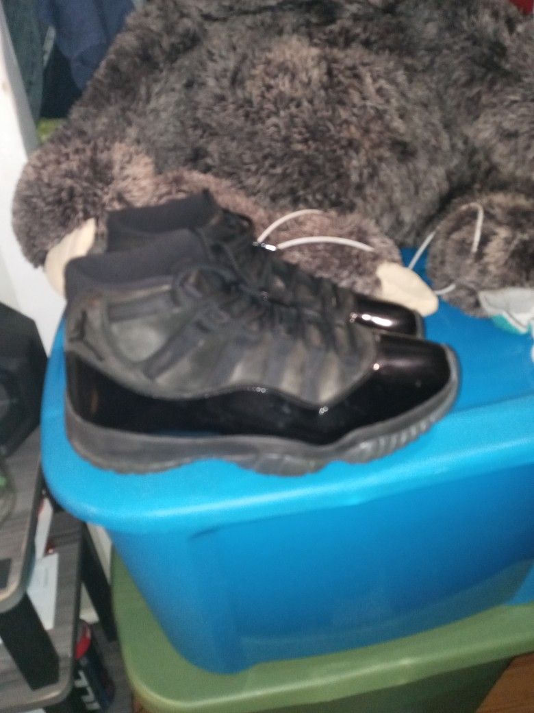 Black swade And Leather Jordans 11s