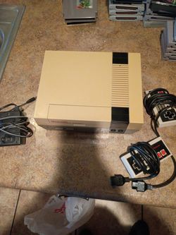 Nintendo NES system yes it's yellowed clean and tested all works $50 today only need gone I live in Glendale