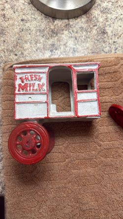 Vintage Cast Iron Horse-Drawn Milk Wagon – $35