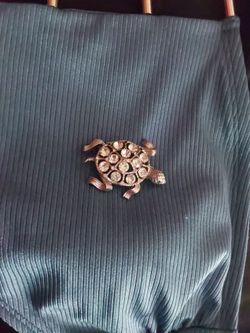 Gold tone vintage figural turtle Brooch with a textured Shell