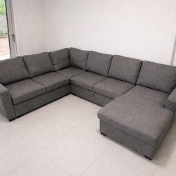 Large Gray Sectional Sofa with Pull-Out Bed + Storage Chaise (110” x 84”)