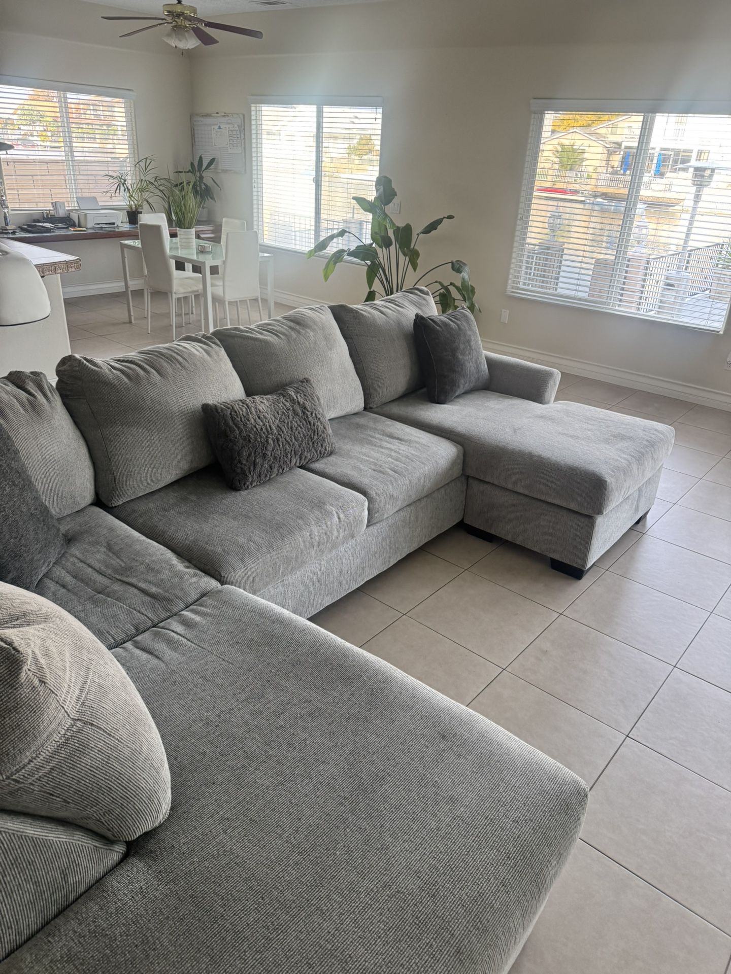 Broyhill sectional couch with ottoman