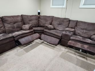 Six seat sectional with four recliners