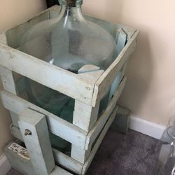 Vintage water bottle in tilt stand from 1923