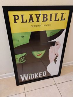 wall poster in frame, design of Playbill theater program cover.Wicked