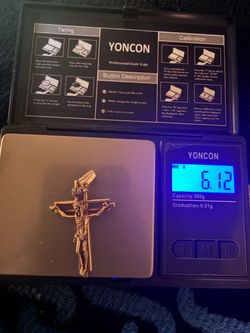 Nice very detailed Jesus 10k solid gold cross has good weight.