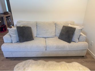 Beige Sofa w/ Accent Pillows